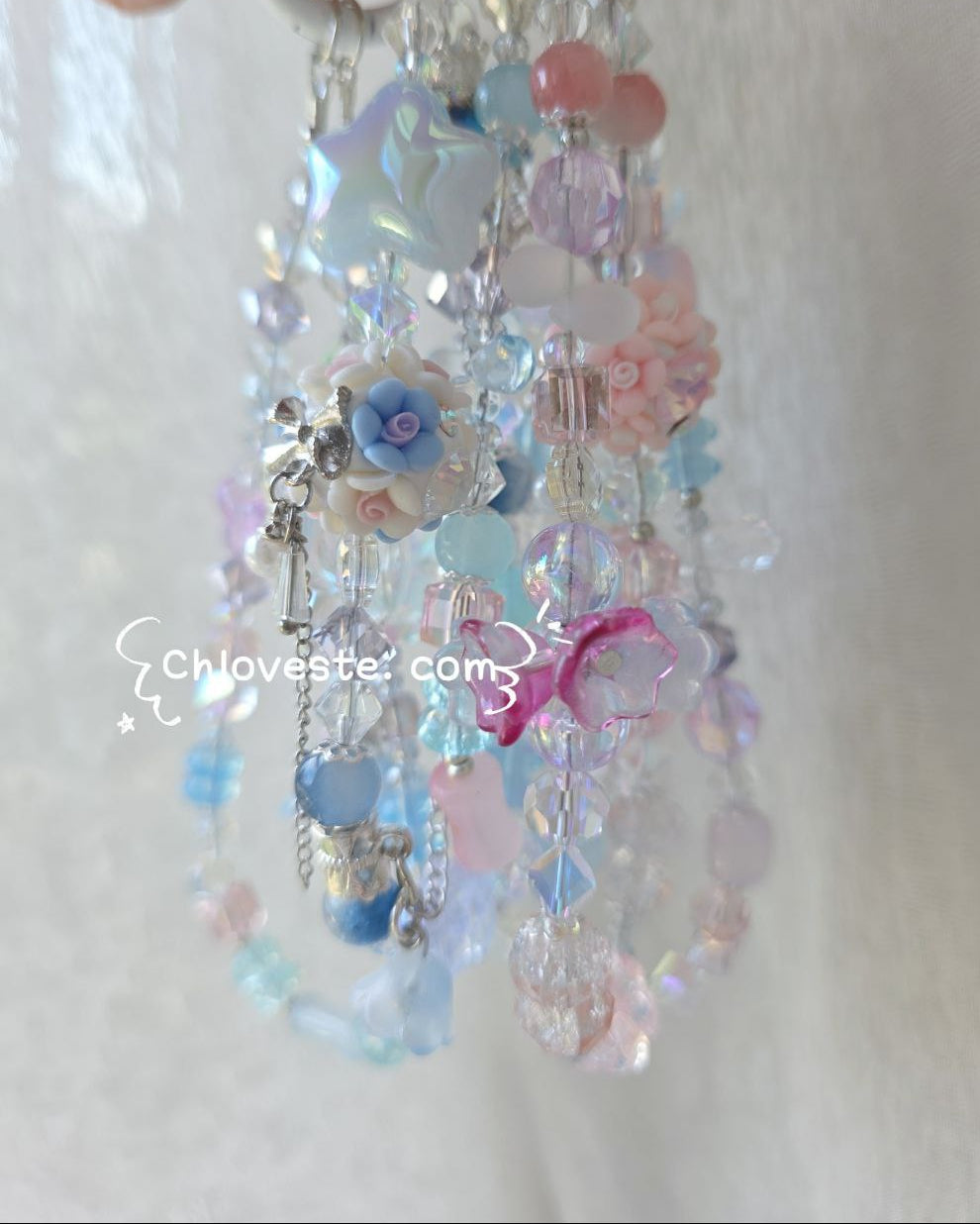 Silver hardware phone strap